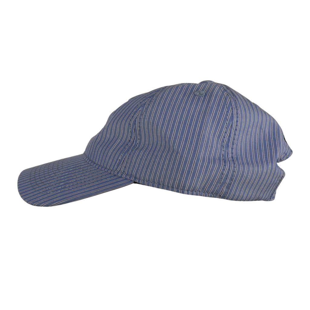CAP OXFORD RAYADA "MUERDE LA MANO"