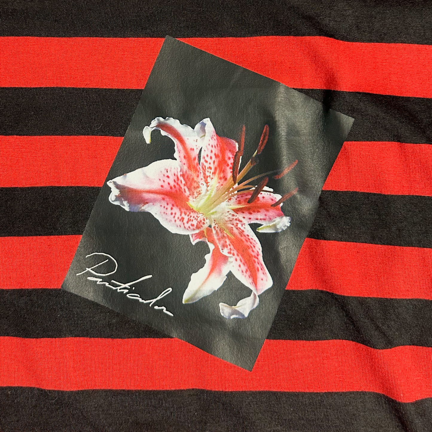 Polera Rayada Flor Boxy